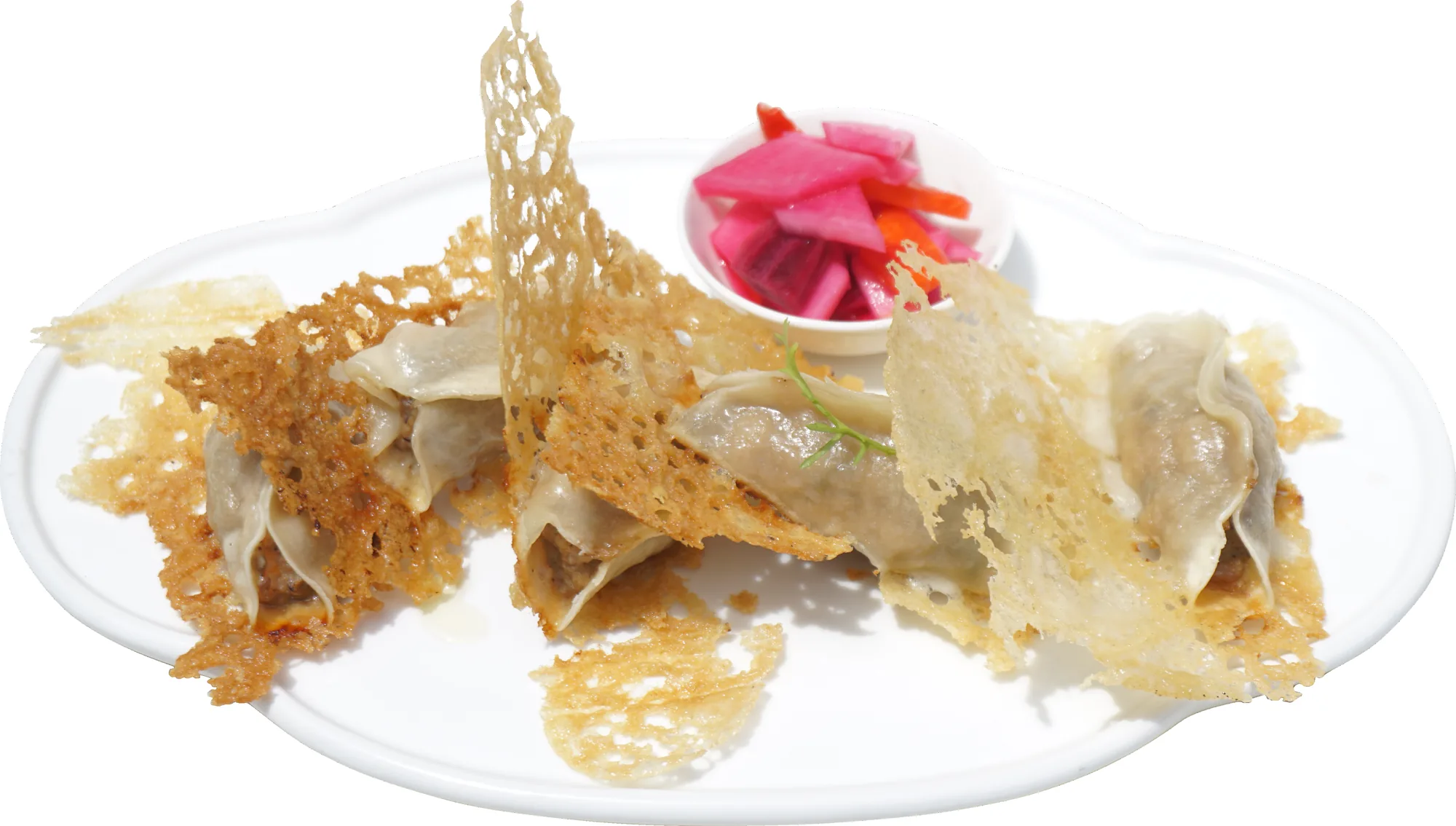 Plate of crispy pan-fried chicken and prawn guo tie with pickled vegetables